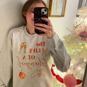 Gray Graphic Sweatshirt with Orange Accents